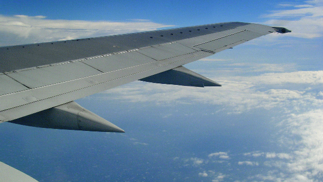 aaa.Plane wing sky fast